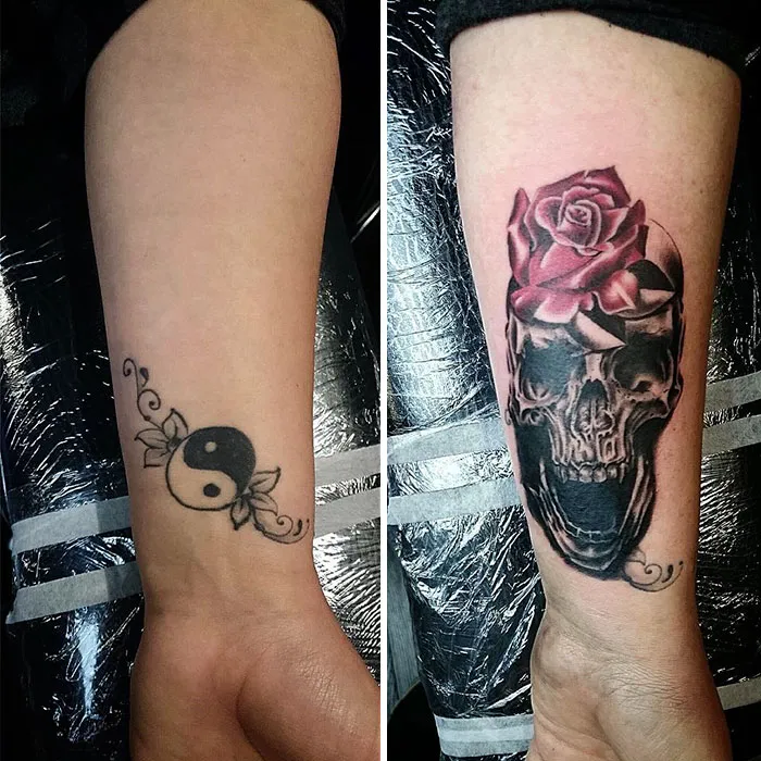 Creative cover-up tattoo transforms a yin-yang symbol into a detailed skull with a rose on an arm.