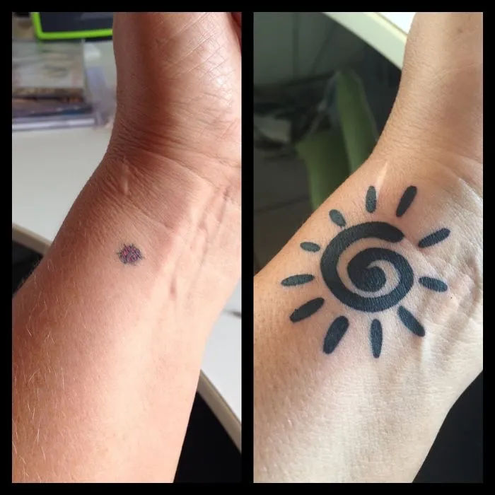 Before and after of a creative cover-up tattoo showing transformation from a small flower to a bold sun design on the wrist.