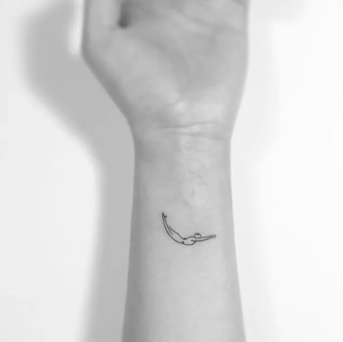 Minimalist tattoo of a simple line drawing on a forearm by a Korean artist.