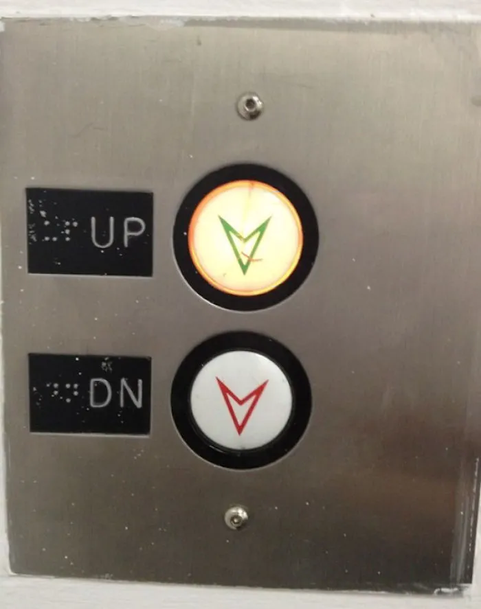 Elevator buttons labeled incorrectly, demonstrating a classic fail at a simple job.