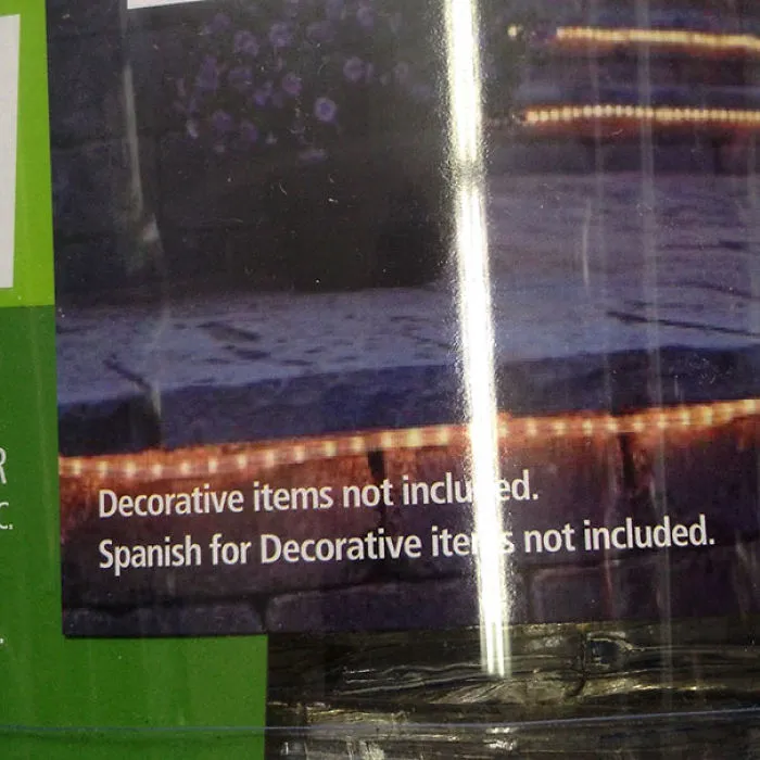 Packaging text error, "Decorative items not included," repeated unnecessarily.