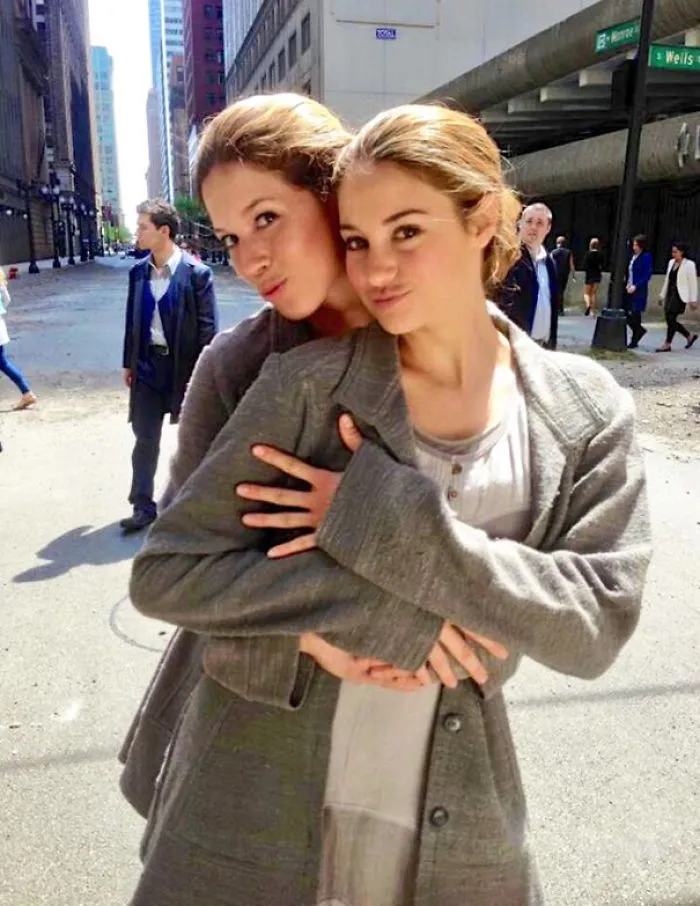 Two women posing closely together on a city street, illustrating Hollywood celebrities’ body doubles in action.