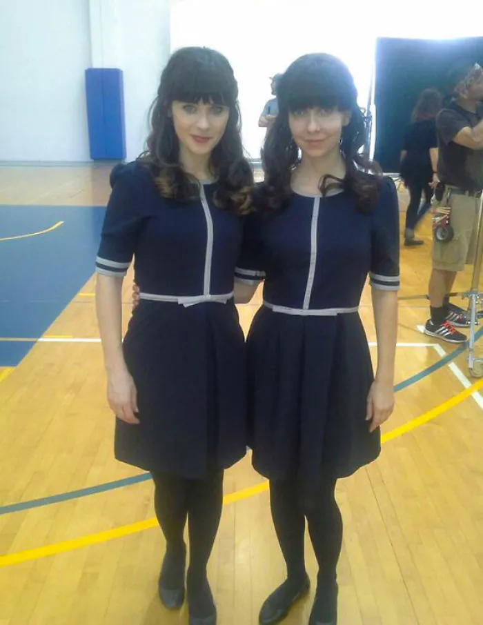 Two women dressed identically in a gym, showcasing Hollywood celebrities’ body doubles on set.
