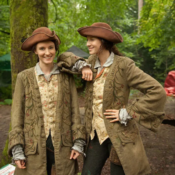 Two women in vintage costumes and hats pose outdoors, illustrating Hollywood celebrities' body doubles in films.