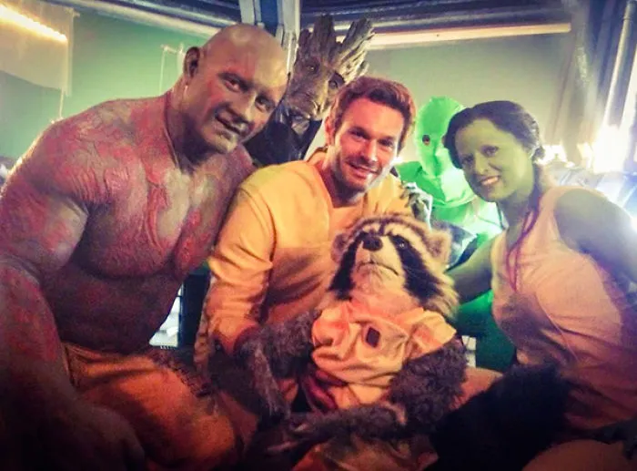 Cast members dressed as Guardians of the Galaxy characters with celebrity body doubles on set in Hollywood.