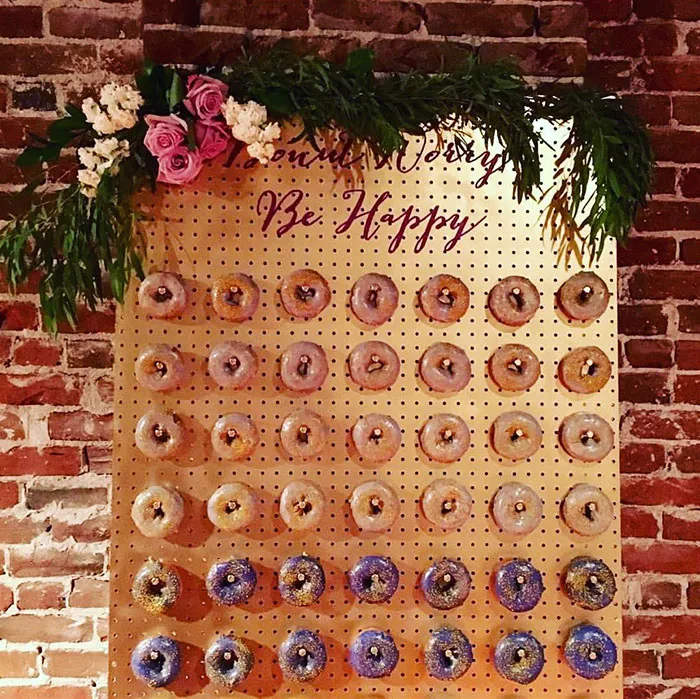 Donut Walls Is The Newest Wedding Trend That Will  Win Over Your Guests' Hearts