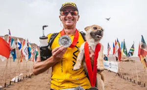 Stray Dog Who Joined Runner On 155-Mile Race Disappears So The Athlete Flies To China To Find Him