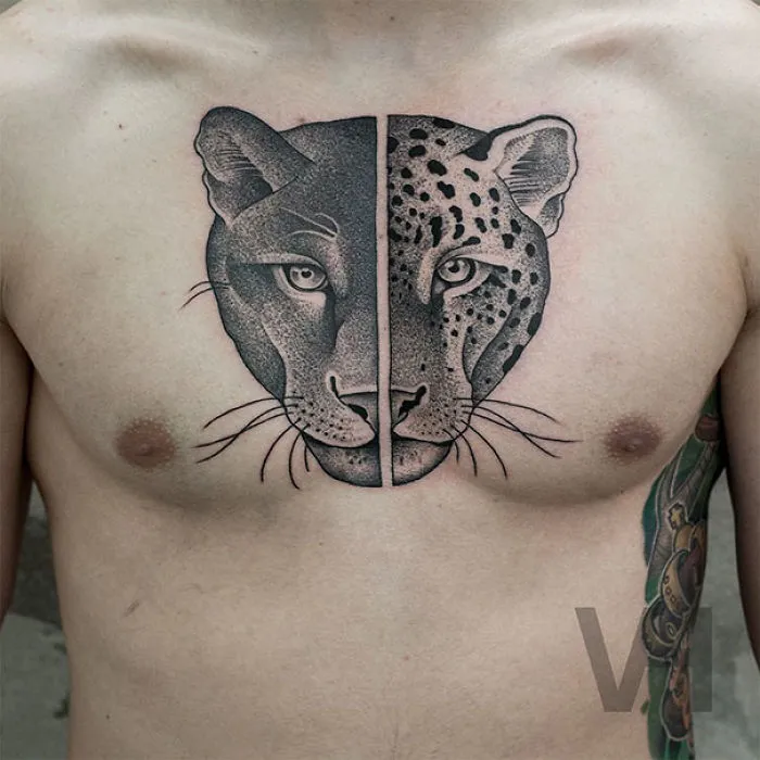 Symmetrical tattoo of a panther and leopard face on chest, blending nature and geometry in perfect balance.