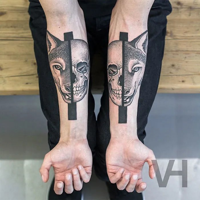 Symmetrical tattoos on forearms blend nature and geometry with wolf and skull designs by Valentin Hirsch.