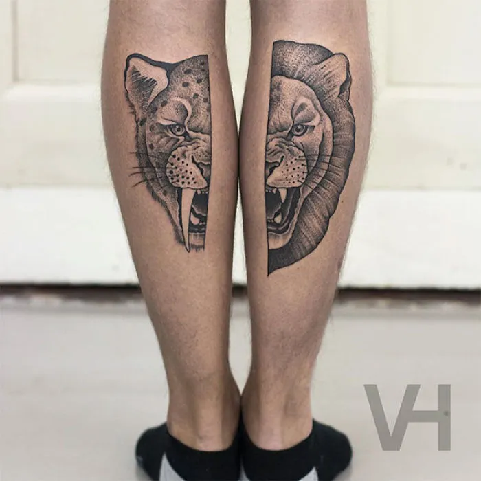 Symmetrical tattoos of a lion and cheetah by Valentin Hirsch, blending nature and geometry on calves.