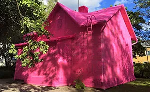 Polish Artist Covers A 100-Year-Old House In Finland With Pink Crochet