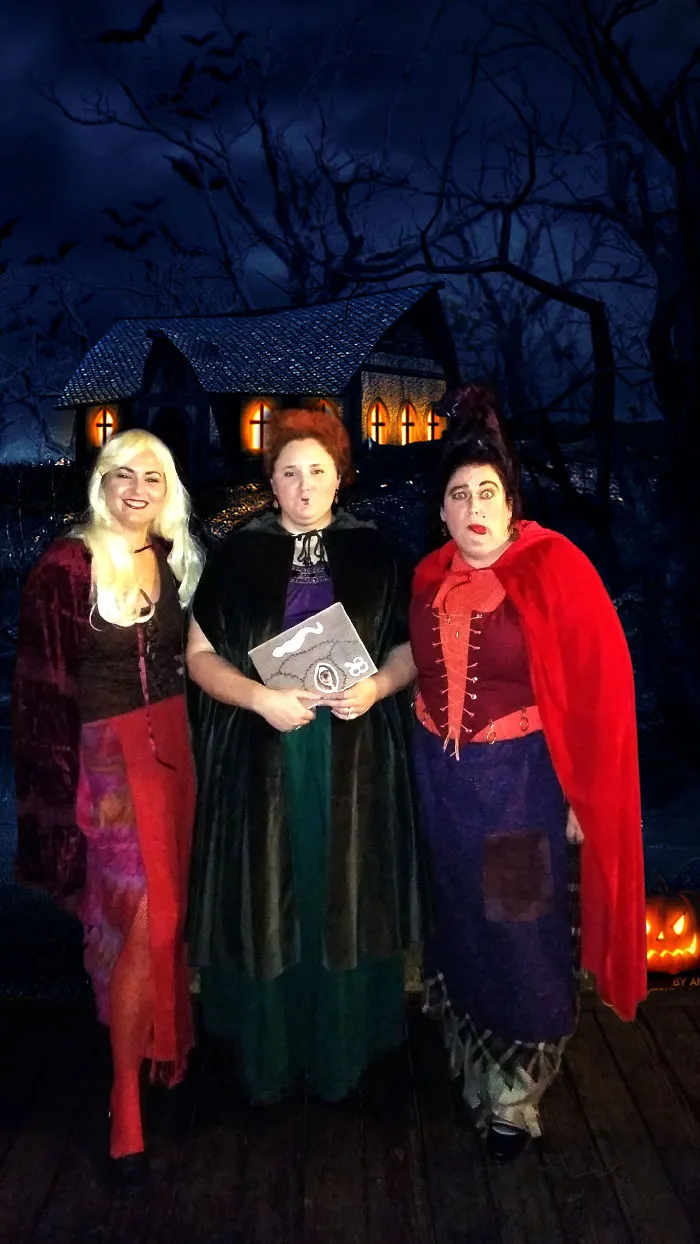 Three women dressed as the Sanderson sisters for creative Halloween costume ideas.