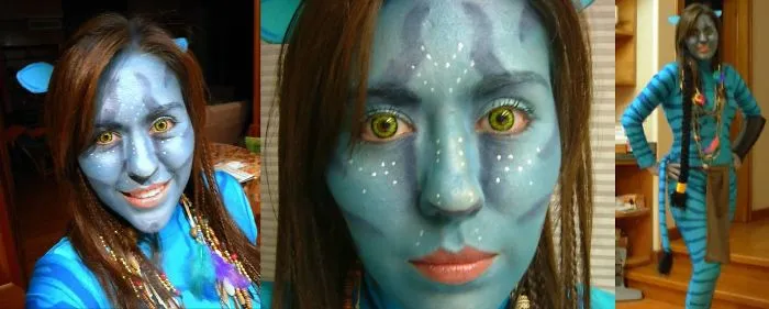 A woman wearing blue body paint and bright contacts for creative Halloween costume ideas inspired by Avatar.