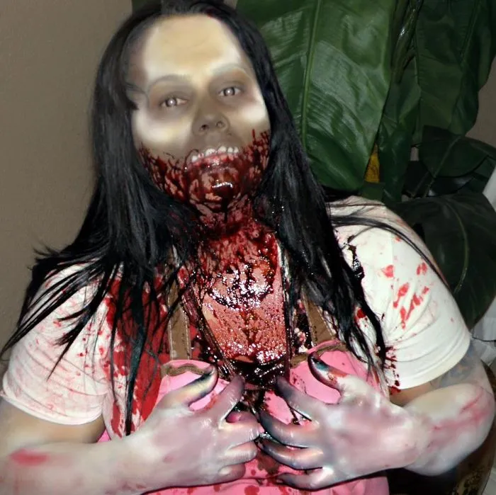 Scary zombie makeup look serving as creative Halloween costume ideas.