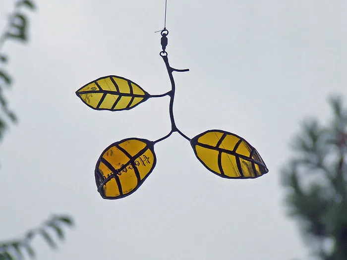Artist Turns Beer Bottles Into Beautifully Curved Leaves