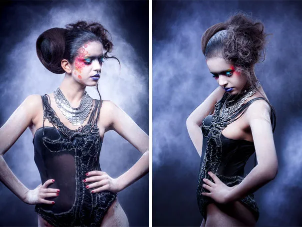 Model in artistic makeup and attire, posing confidently in dramatic lighting, highlighting photography illusions.