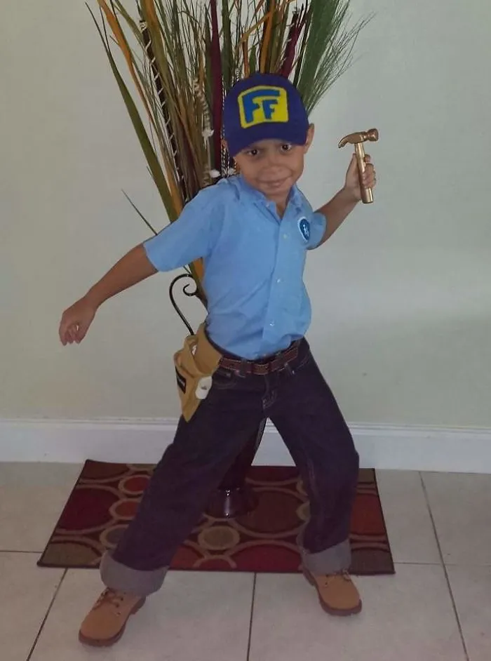 A young boy dressed as Fix-It Felix as creative Halloween costume ideas