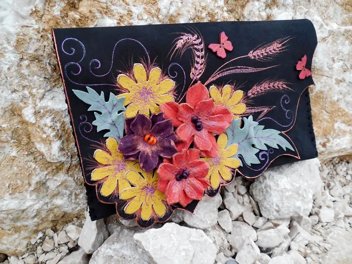I Use Hand Cut Designs And 3D Collage Techniques To Create Unique Leather Bags