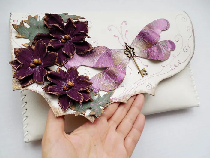 I Use Hand Cut Designs And 3D Collage Techniques To Create Unique Leather Bags