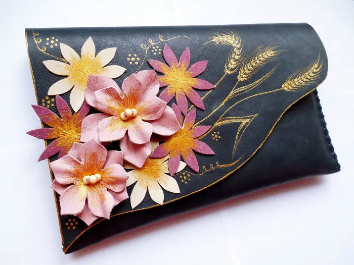 I Use Hand Cut Designs And 3D Collage Techniques To Create Unique Leather Bags