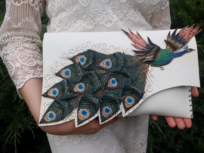 I Use Hand Cut Designs And 3D Collage Techniques To Create Unique Leather Bags