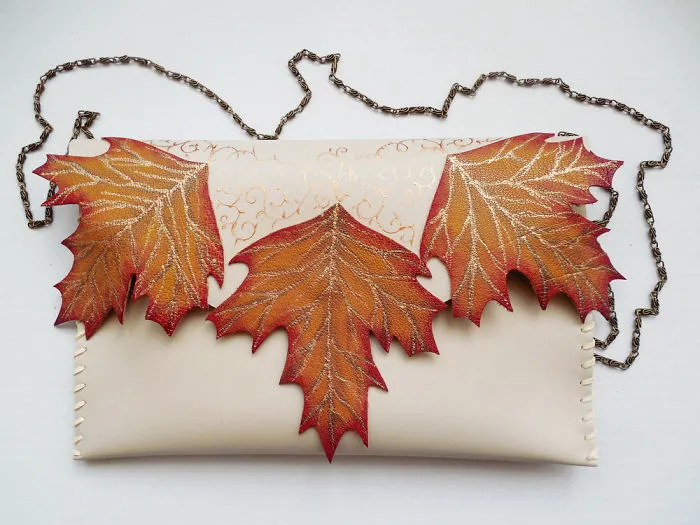 I Use Hand Cut Designs And 3D Collage Techniques To Create Unique Leather Bags