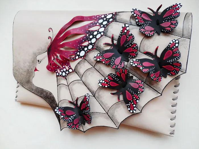 I Use Hand Cut Designs And 3D Collage Techniques To Create Unique Leather Bags