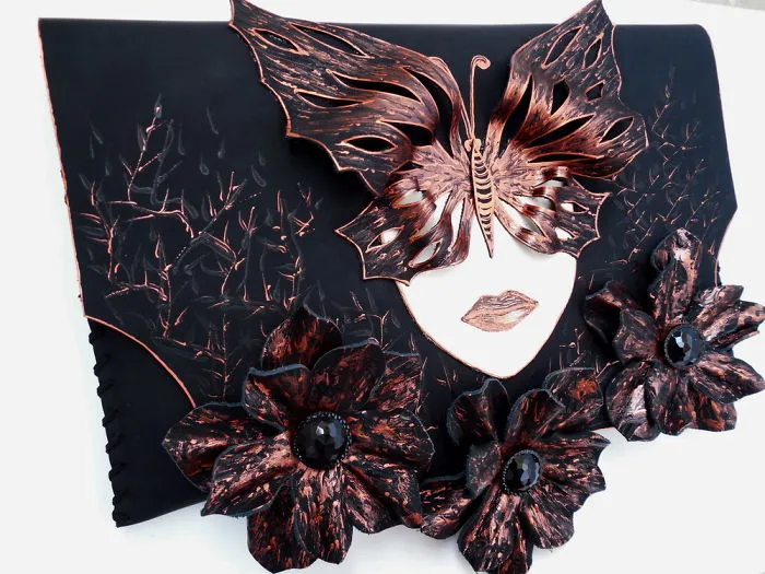 I Use Hand Cut Designs And 3D Collage Techniques To Create Unique Leather Bags