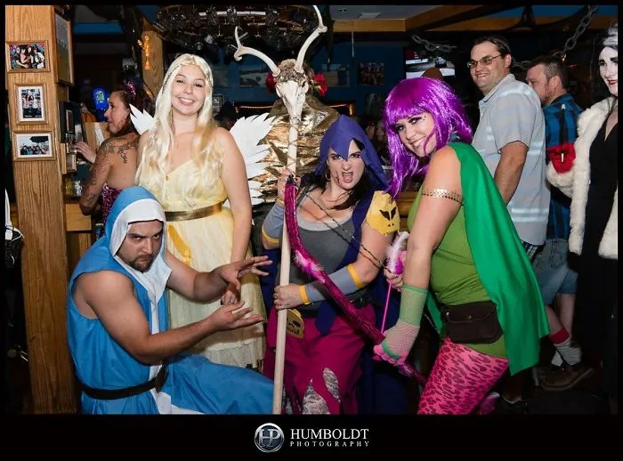 A group of friends in fantasy cosplay as creative Halloween costume ideas