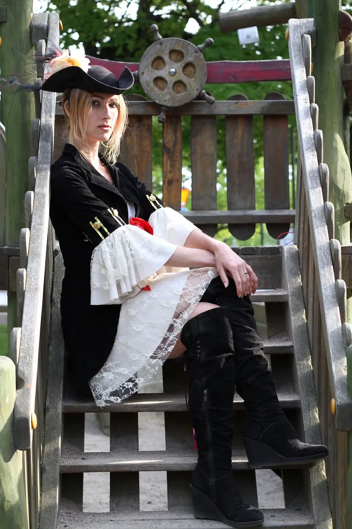 A woman wearing a pirate costume as creative Halloween costume ideas