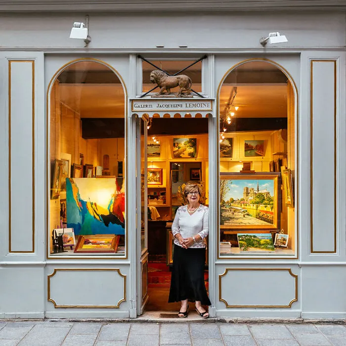 Jacqueline Lemoine, Below The Lion That Welcomes Visitors To Her Art Gallery