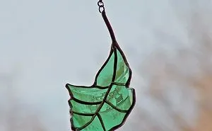 Artist Turns Beer Bottles Into Beautifully Curved Leaves