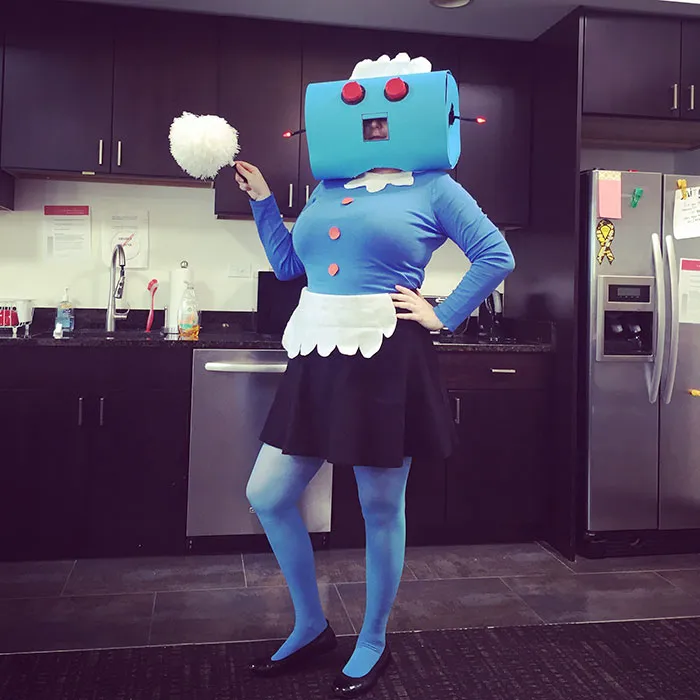 Woman dressed as Rosie the Robot maid from The Jetsons as a creative Halloween costume idea