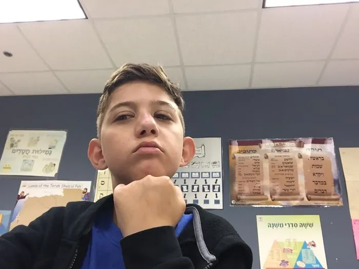 Young boy making a thoughtful face posing for creative Halloween costume ideas