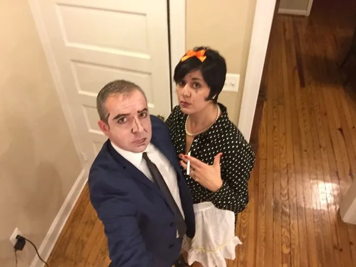 Couple in comic book pop art makeup as creative Halloween costume ideas.