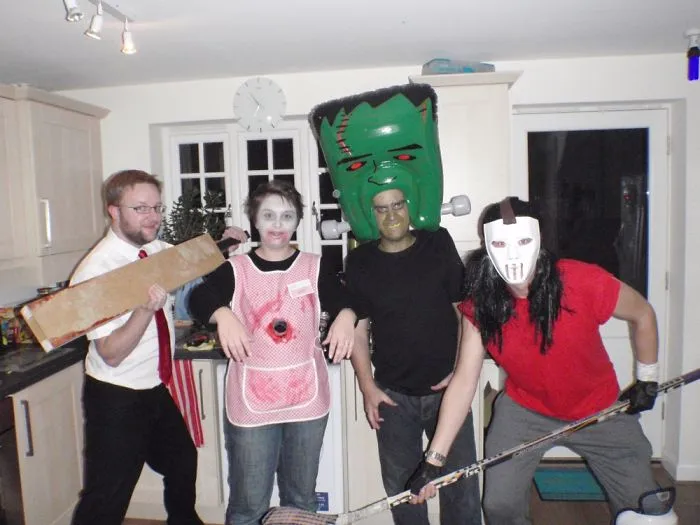 Group of friends wearing creative Halloween costume ideas inspired by classic horror and pop culture characters.