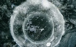 Instead Of Ice Fishing I Take Photos Of Ice Fishing Holes.