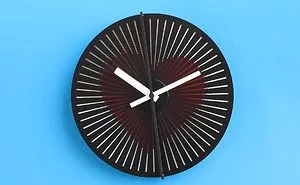 Optical Illusion Wallclocks Show Hidden Animations When Their Arrows Moves