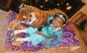 Averie Aka Princess Jasmine And Her Tiger Rajah On The Magic Carpet Ride.