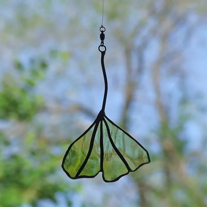 Artist Turns Beer Bottles Into Beautifully Curved Leaves