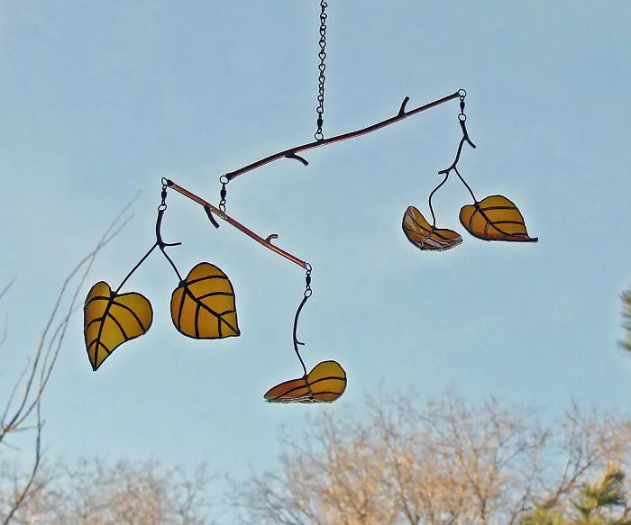 Artist Turns Beer Bottles Into Beautifully Curved Leaves