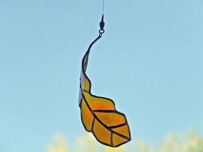 Artist Turns Beer Bottles Into Beautifully Curved Leaves