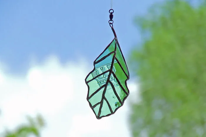 Artist Turns Beer Bottles Into Beautifully Curved Leaves