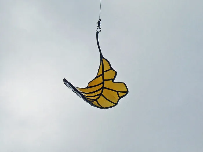 Artist Turns Beer Bottles Into Beautifully Curved Leaves