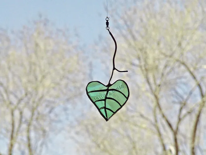 Artist Turns Beer Bottles Into Beautifully Curved Leaves