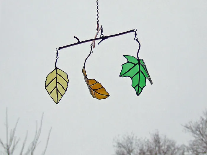 Artist Turns Beer Bottles Into Beautifully Curved Leaves