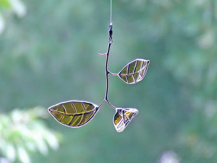 Artist Turns Beer Bottles Into Beautifully Curved Leaves
