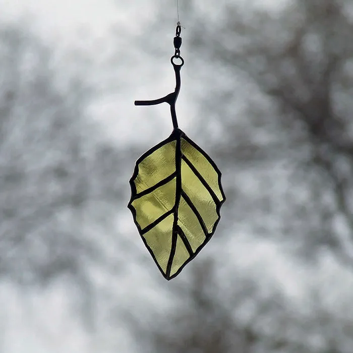 Artist Turns Beer Bottles Into Beautifully Curved Leaves