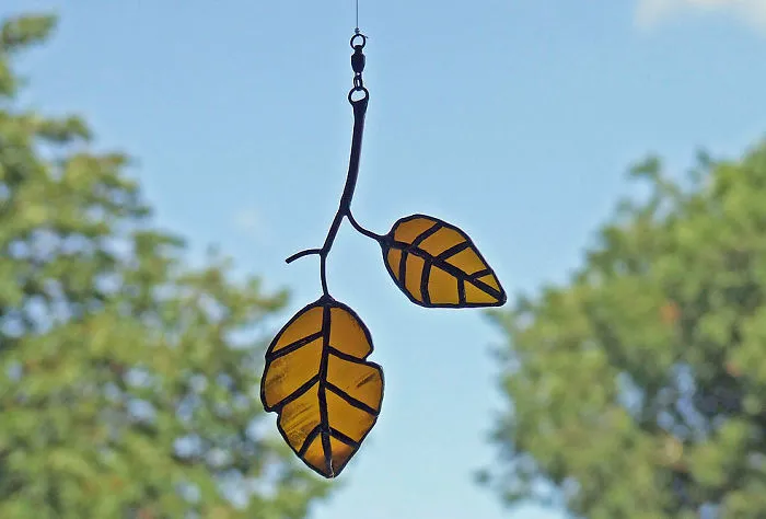 Artist Turns Beer Bottles Into Beautifully Curved Leaves