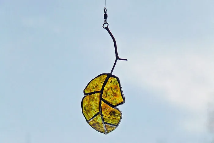 Artist Turns Beer Bottles Into Beautifully Curved Leaves